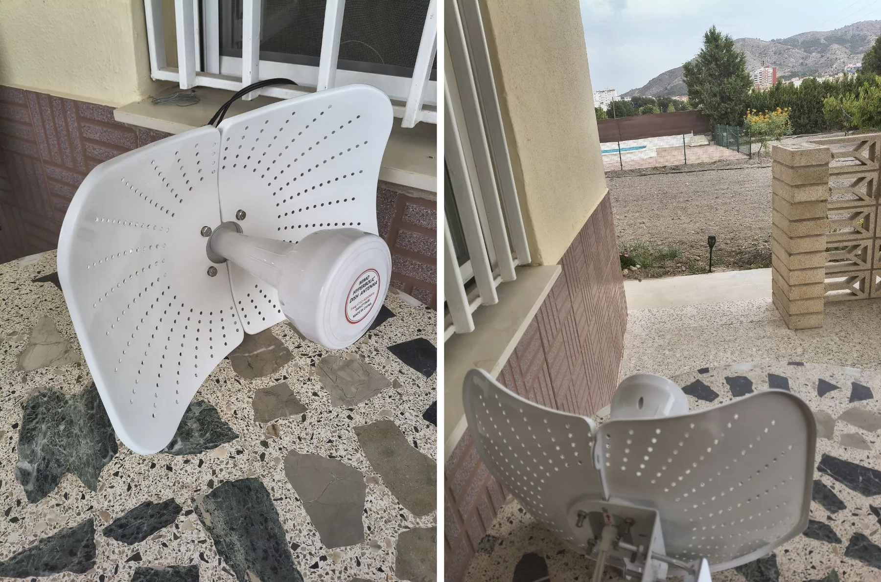La antena direccional parabólica MIMO de las pruebas, de cerca sobre la mesa y colocada apuntando hacia la torre de telefonía